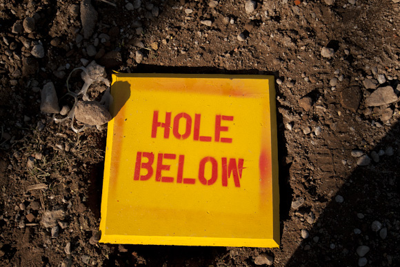 hole below sign